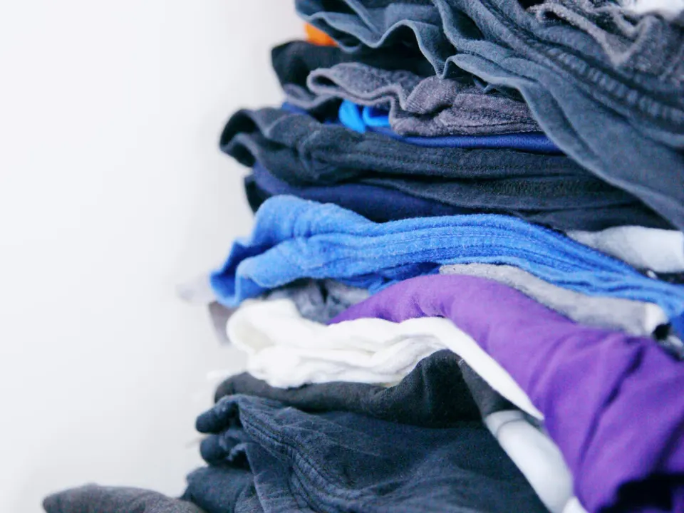 Folded office towels prepared for commercial laundry pickup